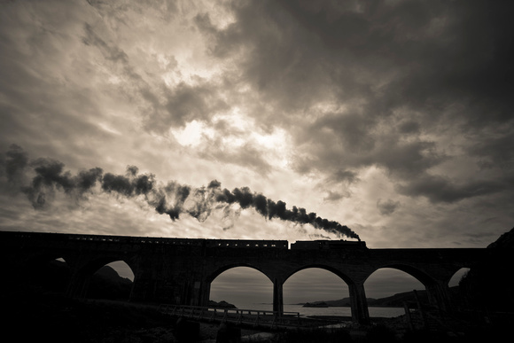 Harry Potter Steam Train passing over the Loch nan Uamh Viaduct near Arisaig